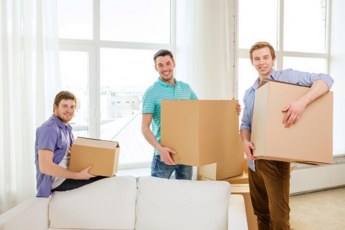 Professional movers handling a flat move in West London