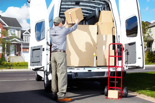 Packed boxes and furniture prepared for a Perivale house move