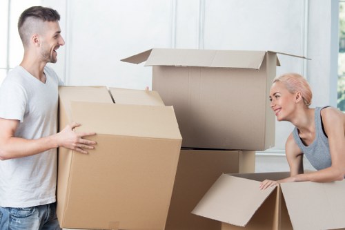 Moving boxes and furniture with a removal van in Perivale
