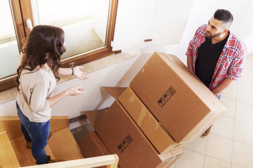 Packing boxes and furniture for a local move in Perivale