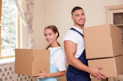 Professional movers handling furniture for a Perivale relocation