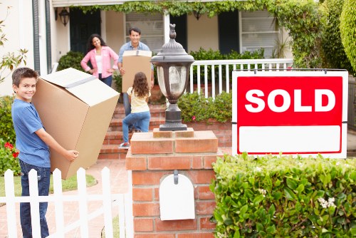 Careful wrapping of fragile belongings for a Perivale move